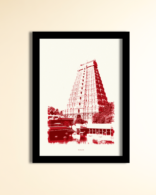 A framed art print featuring a red-toned architectural illustration of a temple tower, displayed against a light beige wall.